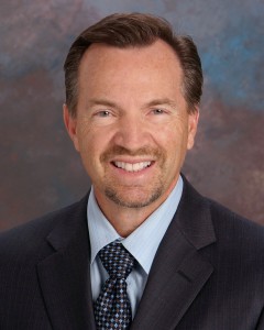 Photograph of Dr. Kris Smith, a neurosurgeon based in Phoenix, Arizona who specializes in brain and spine tumor treatment.