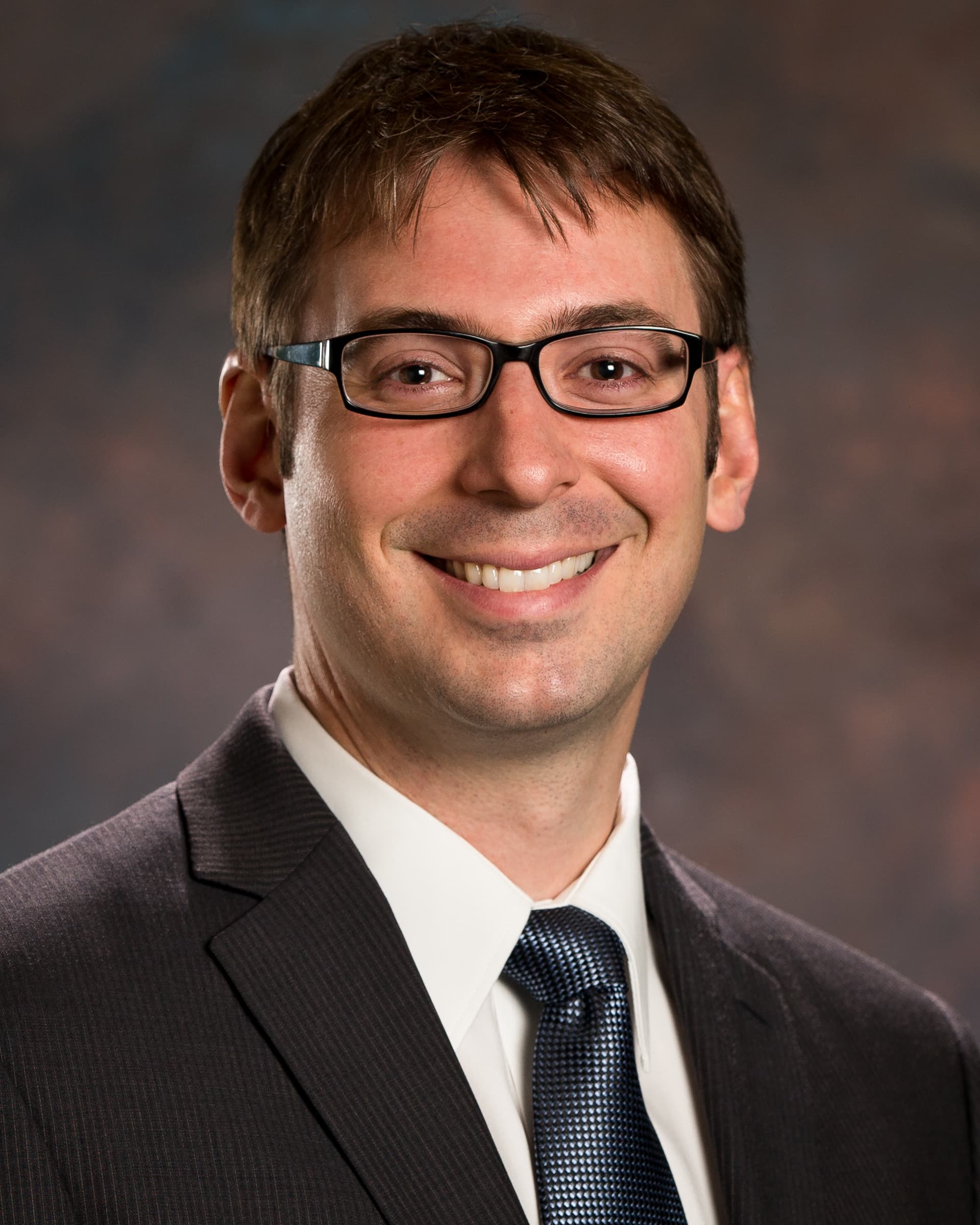 Photograph of Dr. Andrew Ducruet, a Phoenix-based neurosurgeon who specializes in vascular diseases of the brain and spine.