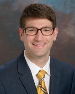 Photograph of Dr. Kaith Almefty, MD, a neurosurgeon and specialist in acoustic neuroma and meningioma treatment.