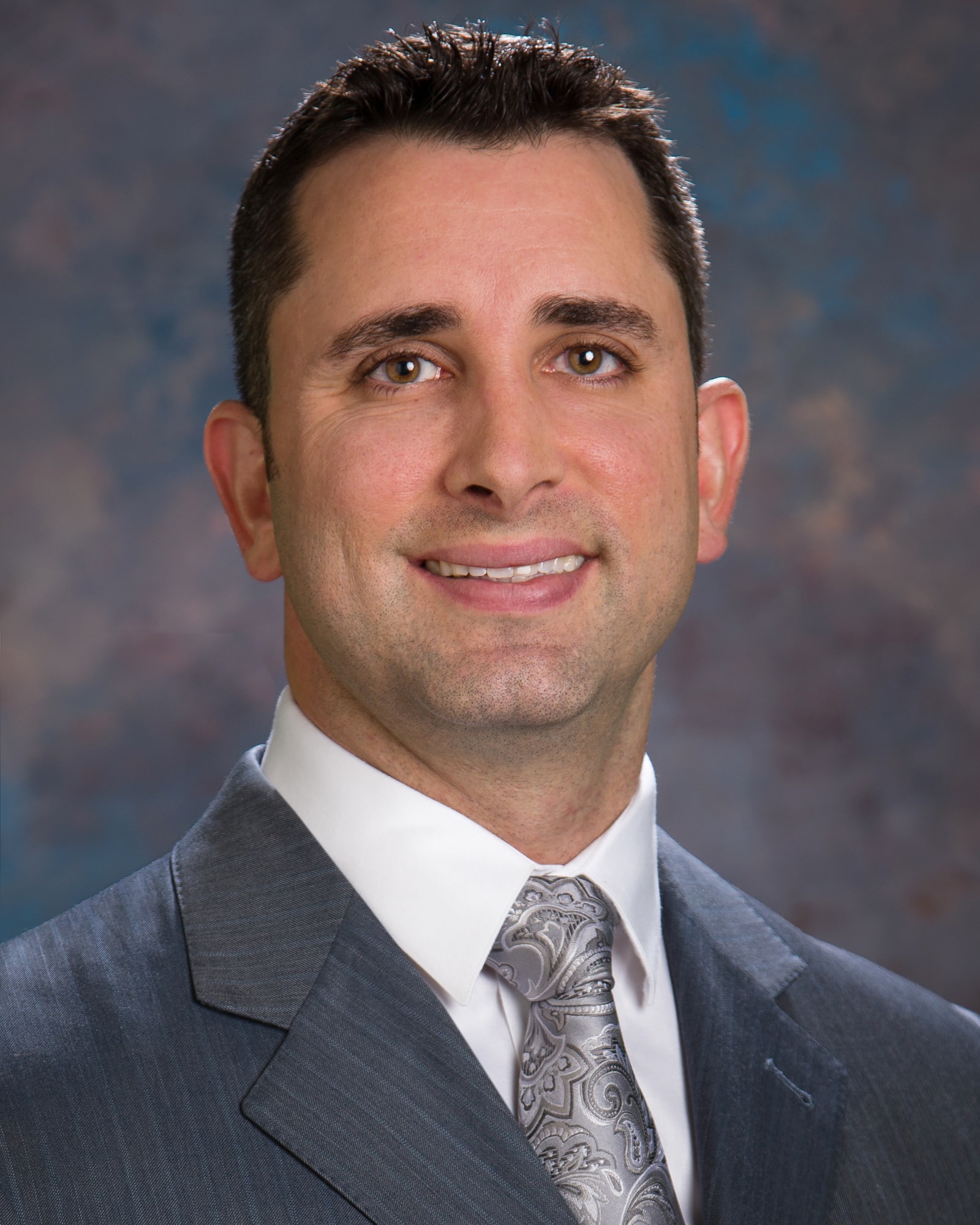Photograph of Dr. Jay Turner, PhD, a Phoenix-based neurosurgeon specialized in complex spinal surgery and spinal tumor treatment.