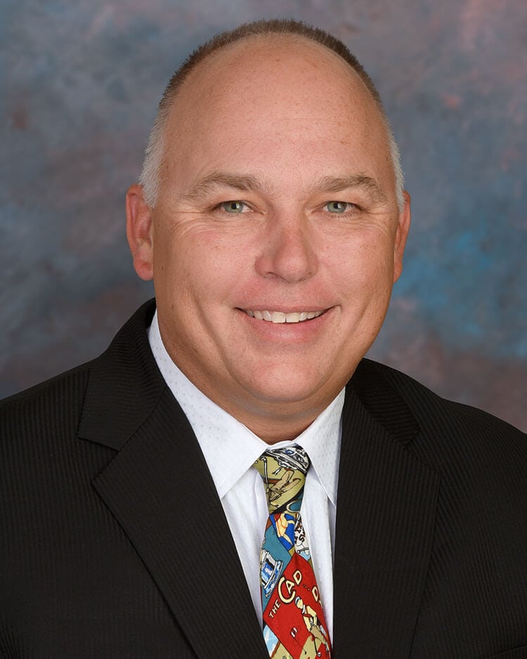 Photograph of Dr. Scott Kreiner, a Phoenix-based interventional spine care and sports medicine specialist.